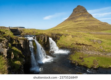 Mt. Kirkjufell and Kirkjufellsfoss waterfall in Iceland