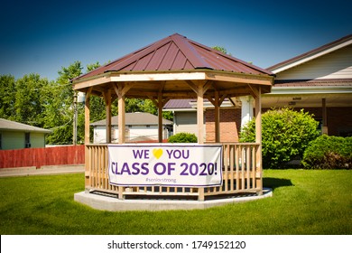 Mt Pulaski, IL / USA -May 2020: A Large Gazebo With A Banner Hung From The Railing Acknowledges The Local Graduating High School Seniors That Have To Have A Virtual Graduation Due To The Coronavirus. 