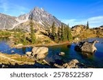 Mt Stuart Rises Above Lake Ingalls among Fall Color in Washington