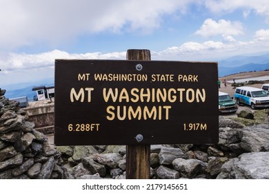 Mt Washington, VT - June 30 2021: A sign at the Mount Washington Summit reads the height and elevation at the mountain's summit. 