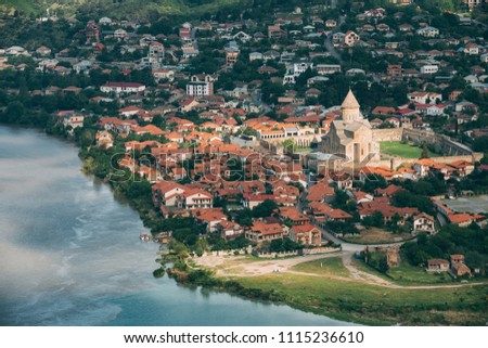 Mtskheta, Georgia. Top View Of Ancient Town Located At Valley Of Confluence Of Rivers Mtkvari Kura And Aragvi In Picturesque Highlands. Autumn Season