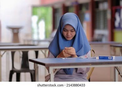 Muadzam Shah, Malaysia - April 7th, 2022 : Lateral-Flow-Test Covid Rapid Home-use Test Kit For Saliva - Step 2 - Spit With Mouth Through Funnel In Plastic Tube To Collect Sample.