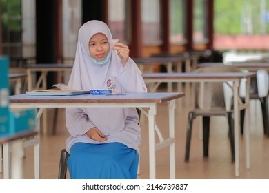 Muadzam Shah, Malaysia - April 7th, 2022 : Lateral-Flow-Test Covid Rapid Home-use Test Kit For Saliva - Step 2 - Spit With Mouth Through Funnel In Plastic Tube To Collect Sample.