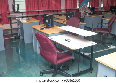 Muadzam Shah , Malaysia - May 7,  2017 : Chairs and tables in the flooded computer room at  Kolej Vokasional Muadzam Shah, Malaysia.