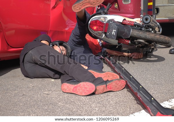 Muadzam Shah, Pahang - October 18th, 2018 : \
Motorcyclists lying on the road after the accident during the Inter\
Agency Disaster Training Program\
2018