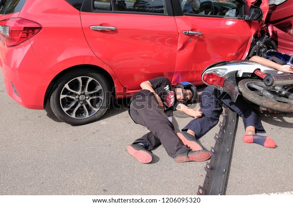 Muadzam Shah, Pahang - October 18th, 2018 : 
Motorcyclists lying on the road after the accident during the Inter
Agency Disaster Training Program
2018