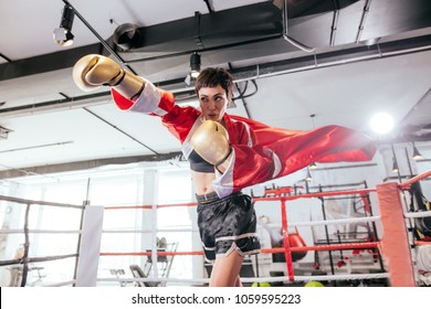 muay thai boxer hitting opponent a heavy blow on the ring. mortal blow. fast blow. championship fight. - Powered by Shutterstock