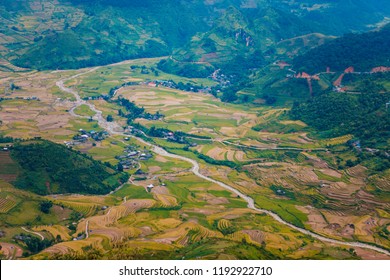MUCANGCHAI, VIETNAM, September 29, 2018: Rice terraces in water season in Vietnam. The terraces are farmed by Hmong ethnic minorities. The Vietnamese farmers planting on the paddy field
