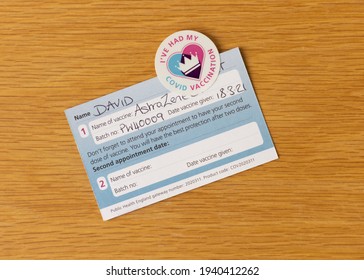 Much Hadham, Hertfordshire, UK. March 19th 2021. COVID 19 Vaccination Card And Sticker, Issued To People Who Have Had Their First Injection.