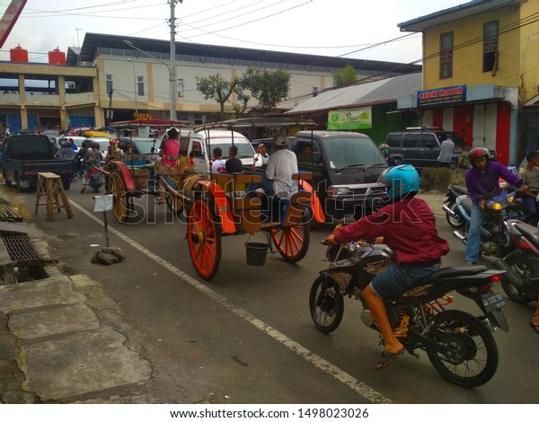 much kind transportation at\
street in Temanggung, Central Java, INDONESIA. Jun 3, 2019.\
