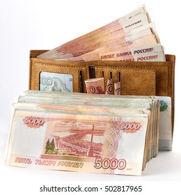 Much russian money rubles in wallet. Isolated object on white.