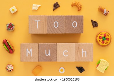 Too Much; Seven Wooden Blocks With 