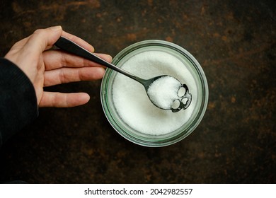 Too much sugar. Death, posinom, skull as a spoon with a pot of white sugar.