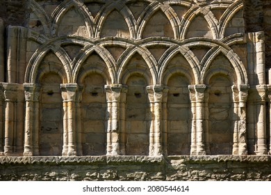 Much Wenlock, Shropshire, England, Britain, Jul 17th 2016. View Of Sunlit Ornate Chapter House Architecture In St Milburgas  12th Century Anglo Saxon Priory.