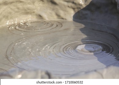 Mud Circles In Mud Volcano In Romania. The Berca Mud Volcanoes Is A Geological And Botanical Reservation. Small Volcano-shaped Structures Caused By The Eruption Of Mud And Natural Gases.