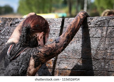 Mud Race Runners During Extreme Obstacle Races