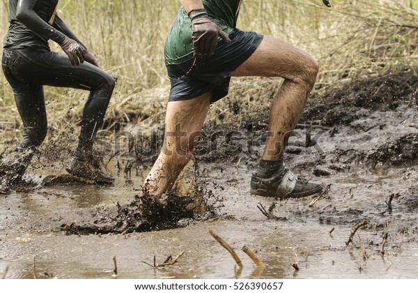 Mud Race Runnersman Running Mud Stock Photo (Edit Now) 526390657