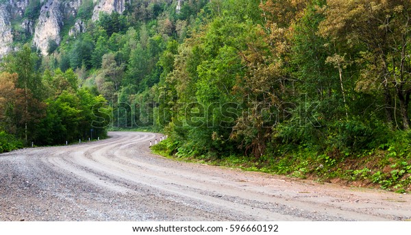 Mud road in mountain
turn left and right