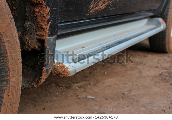 Mud soil stuck under the
car's belly