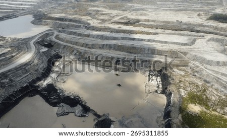 A mud suction tool in coal mining or slurry pump is sucking up the mud that is flooding the mining area, mud flood
