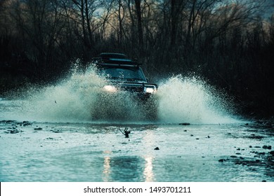 Mud And Water Splash In Off Road Racing. Scene Of Wather Splash In Off-road Racing. Offroad