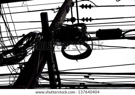 Muddle wire on electrictity post in Thailand
