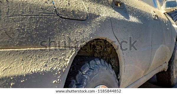 Muddy car under the hot\
sun