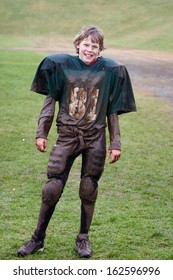 Muddy Football Player