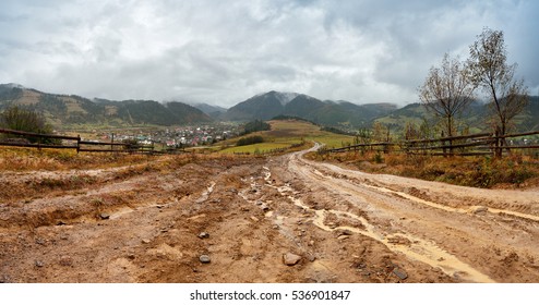 Muddy ground after rain in Carpathian mountains. Extreme path rural dirt road in the hills - Powered by Shutterstock