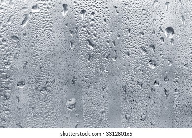 Muddy Misted Window Glass With Water Drops As Background