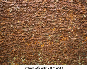 Muddy stains on the walls are used for background.
