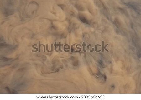 Muddy water, abstract brown background. Water surface. Pattern.