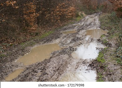 Muddy wet countryside road