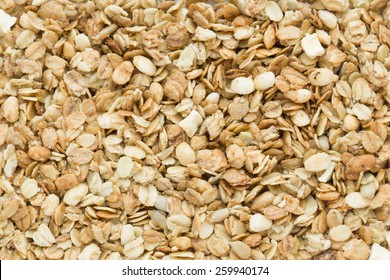 Muesli Background Texture With Wheat And Corn Crisps, Flakes And Sunflower Seeds