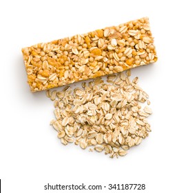 Muesli Bar And Oat Flakes On White Background