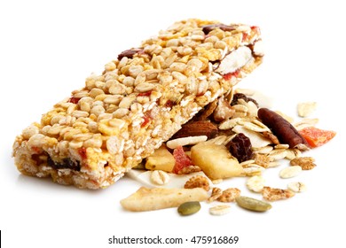 Muesli Bar On Heap Of Fruit, Seeds And Nuts.