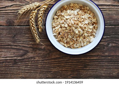 Muesli Cereal Mix In A Vintage Bowl . Wooden Background, Copy Space