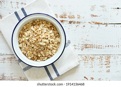 Muesli Cereal Mix In A Vintage Bowl . Wooden Background, Copy Space