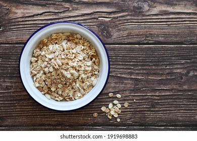 Muesli Cereal Mix In A Vintage Bowl . Wooden Background, Copy Space