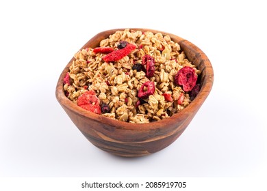 Muesli cereals in bowl with  raisins, oat and wheat flakes, fruits, strawberry, cranberry, cherry pieces. Isolated on white - Powered by Shutterstock