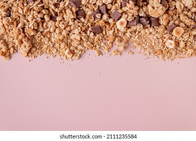 Muesli with chocolate nut crumble, food background, space for text