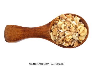 Muesli in spoon over white background.