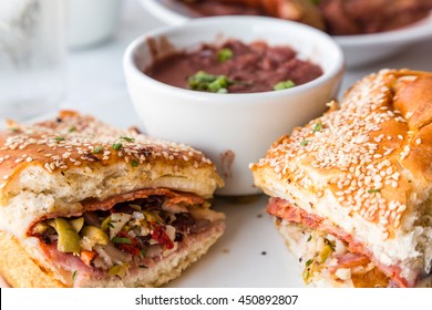 Muffalatta Sandwich With Cup Of Red Beans In New Orleans Restaurant