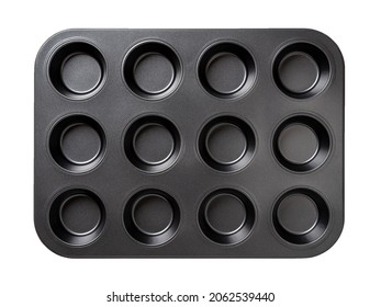 Muffin Cake Pan With Non-stick Coating Isolated On A White Background. 12-cup Muffin Baking Tray. Empty Cupcake Bake Ware For Pie, Tart, Cake And Pastries Concepts. Kitchen Utensils. Top View.