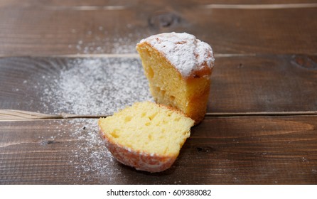 muffin on natural wooden board - Shutterstock ID 609388082