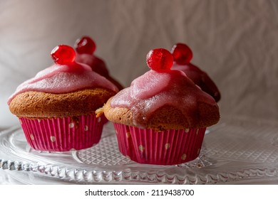 Muffin With Sour Cherries, Topping From Cherry Juice And Powdered Sugar And Topping Cherry