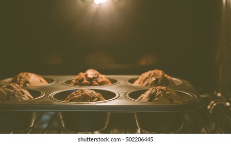 Muffins Baking In Oven