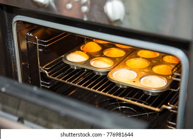 Muffins On A Baking Tray In The Open Oven