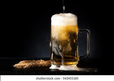  Mug Beer On A Black Background