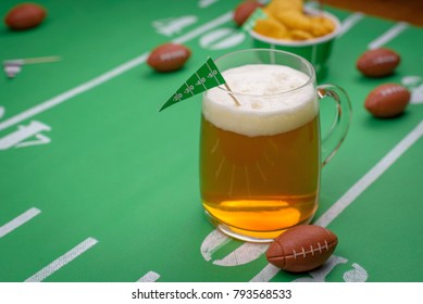 Mug Of Beer On Snack Table Decorated For Superbowl Party